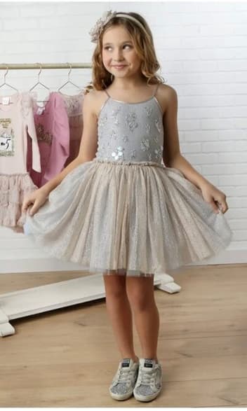 Dresses by Ooh la la Couture & sold by Silhouette London